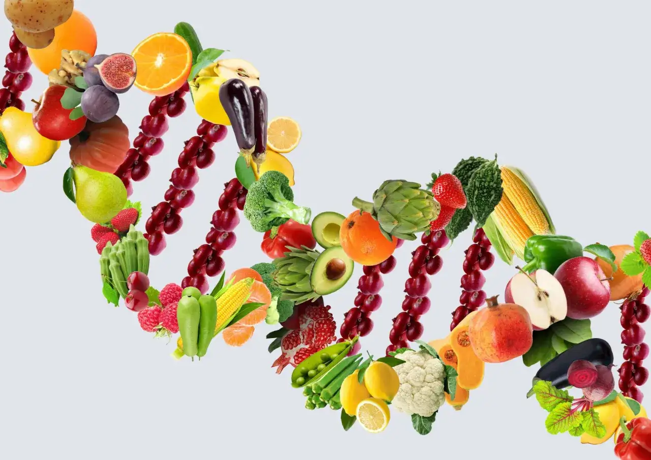 Frukt och grönsaker i en DNA-spiral. Hur mycket frukt per dag? En hälsosam kost är grunden för ett friskt liv.