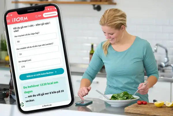 Kvinna använder app för att räkna ut sitt kaloribehov. Appen visar 1530 kcal/dag för viktnedgång, men inte hur mycket kolhydrater per dag.